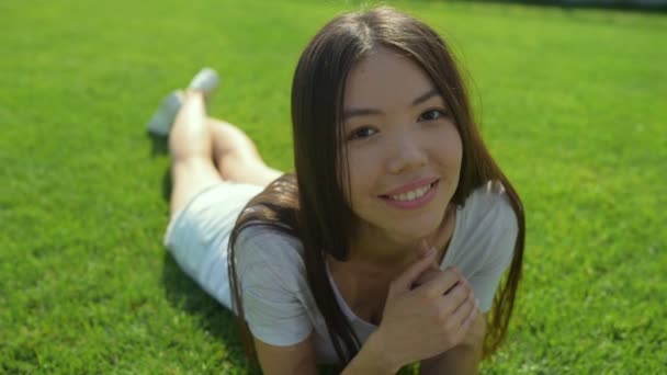 Kind beautiful girl smiling at you — Stock Video