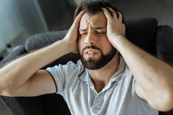 Cheerless desperate man suffering — Stock Photo, Image