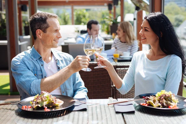 Nice positive man and woman having a date — Stock Photo, Image