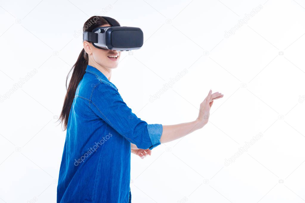 Delighted good looking woman using 3d glasses