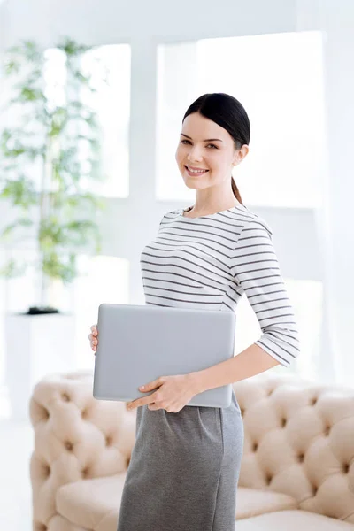 Pleasant successful businesswoman being at work