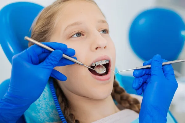 Nice young girl wearing braces — Stock Photo, Image