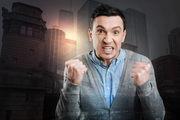 Extremely angry millennial guy losing his temper — Stock Photo, Image