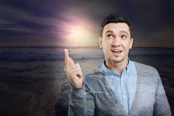 Cheerful young man having amazing idea — Stock Photo, Image