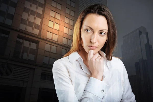 Pensive young woman thinking about something serious — Stock Photo, Image