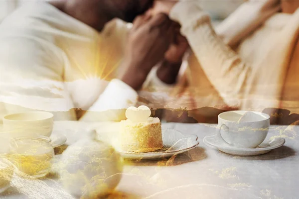 Close up of romantic table with lovers in the background — Stock Photo, Image