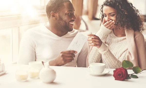 Delighted positive man looking at his girlfriend — Stock Photo, Image