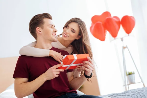 Charming couple celebrating their anniversary at home — Stock Photo, Image