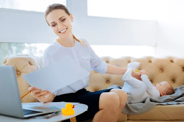 Happy director reading the documents at home — Stock Photo, Image
