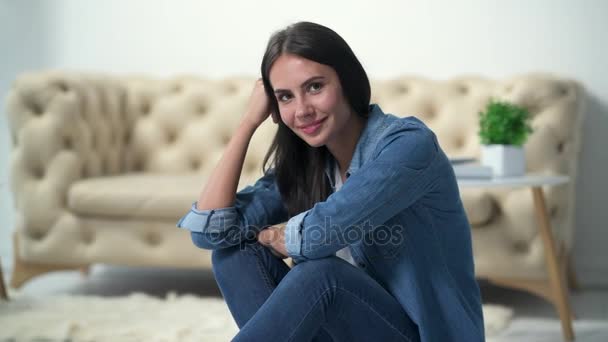 Joyful attractive woman resting at home — Stock Video