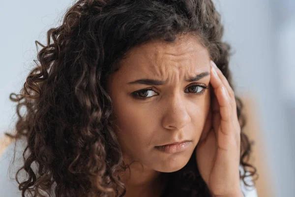 Close up portrait of young lady struggling with headache — Stock Photo, Image
