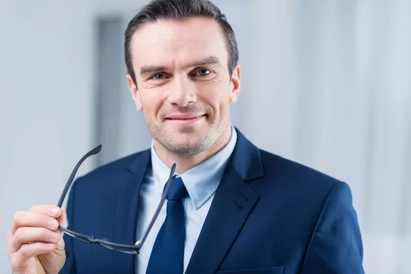 Attractive pleasant man demonstrating his interest — Stock Photo, Image