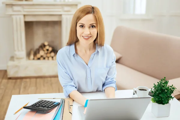 Nice inspired woman working on her laptop — Stock Photo, Image