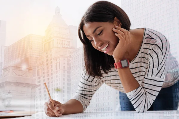 Pretty international woman working with pleasure — Stock Photo, Image