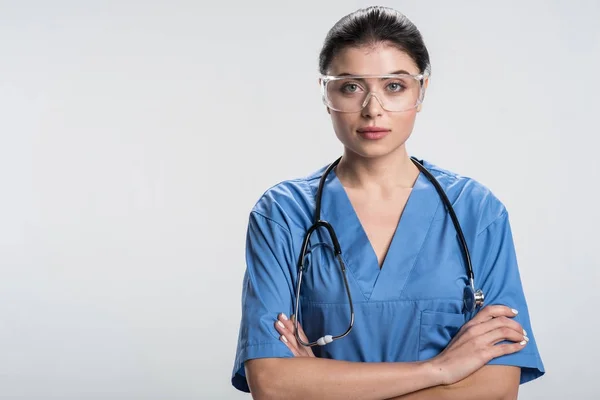 Unga kvinnliga läkare visar power — Stockfoto
