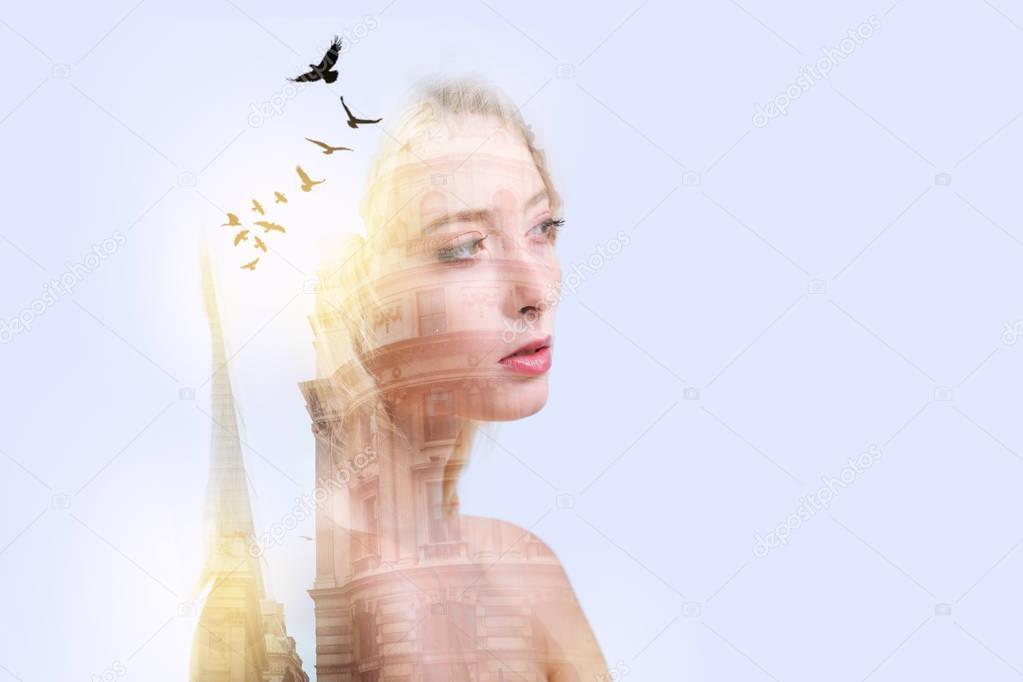 Attractive romantic woman looking in front of her and imagining birds while wanting freedom