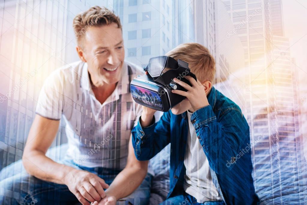 Little boy wearing mask for virtual reality