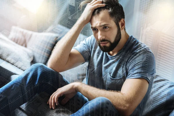Disappointed serious man looking aside and feeling bad himself. — Stock Photo, Image