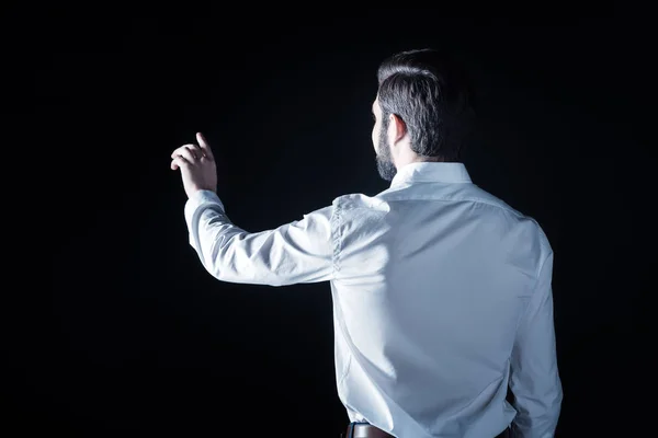 Handsome brutal man turning his back to you — Stock Photo, Image