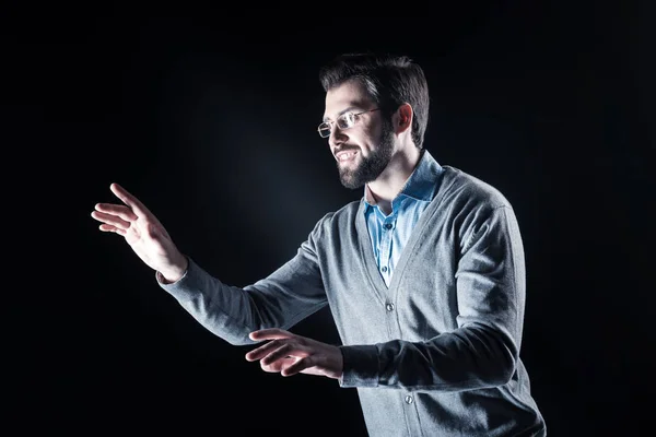 Delighted happy man enjoying his new experience — Stock Photo, Image