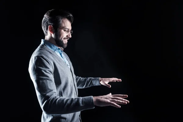 Delighted happy man holding his hands up — Stock Photo, Image