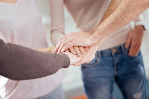 Male and female hands putting together — Stock Photo, Image