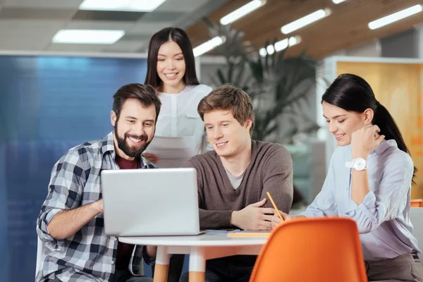 Skillful four colleagues planning strategy — Stock Photo, Image