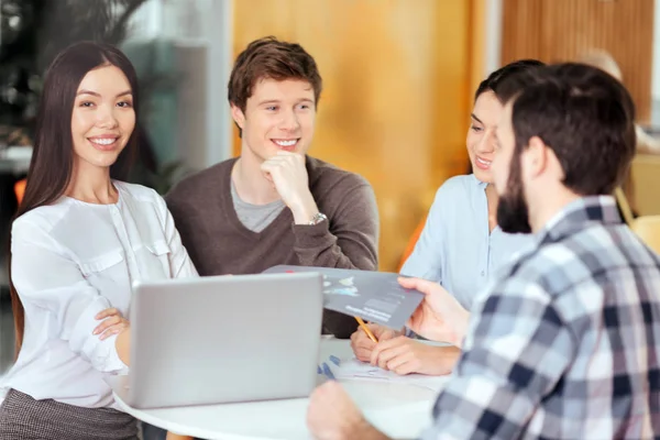 Attractive  four colleagues introducing project — Stock Photo, Image