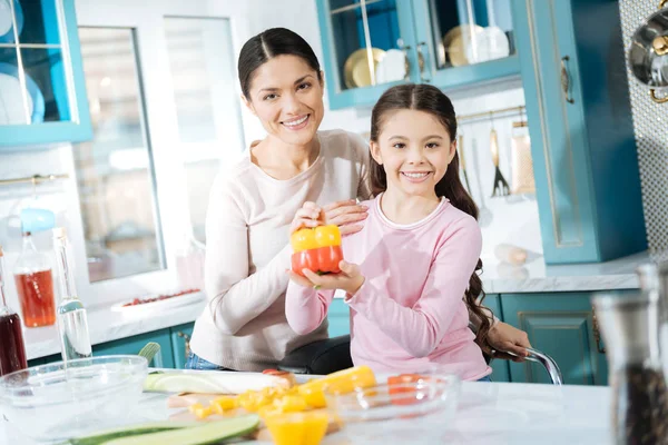 Glad mother and daughter cooking together — Stock Photo, Image