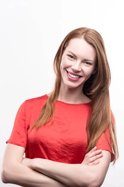 Ginger-haired woman folding her arms across chest — Stock Photo, Image