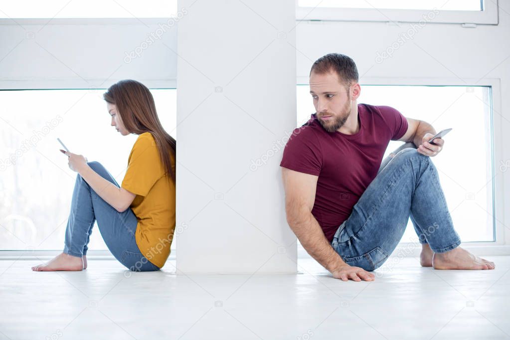 Sad man wanting to make up with his girlfriend