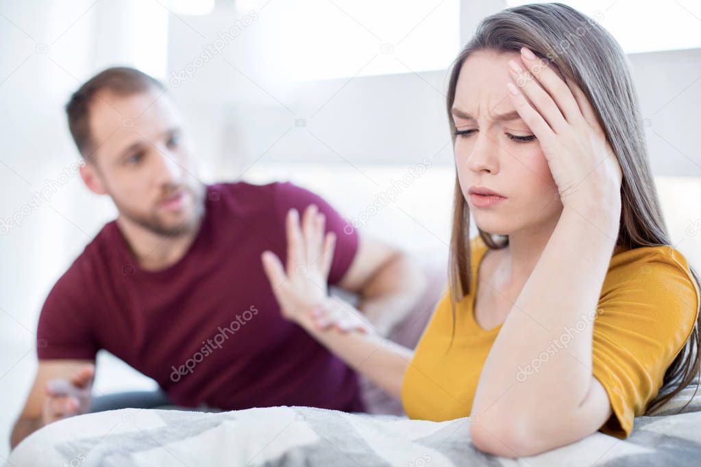 Upset woman not wanting to talk with her man