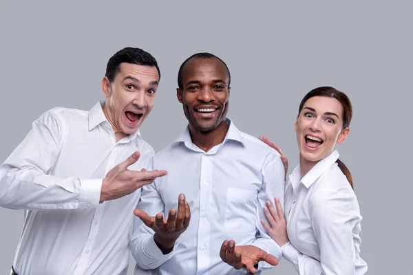 Joyful co-workers having fun and laughing — Stock Photo, Image