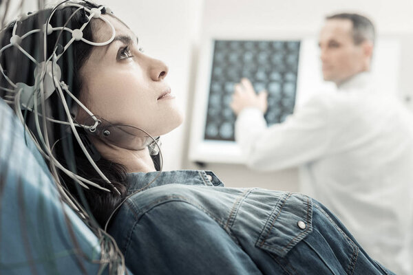 Nice young woman undergoing medical checkup