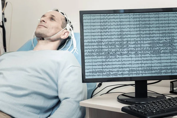 Selective focus of a monitor with electroencephalogram — Stock Photo, Image