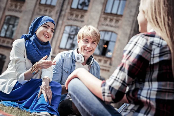 Delighted positive students having a conversation — Stock Photo, Image