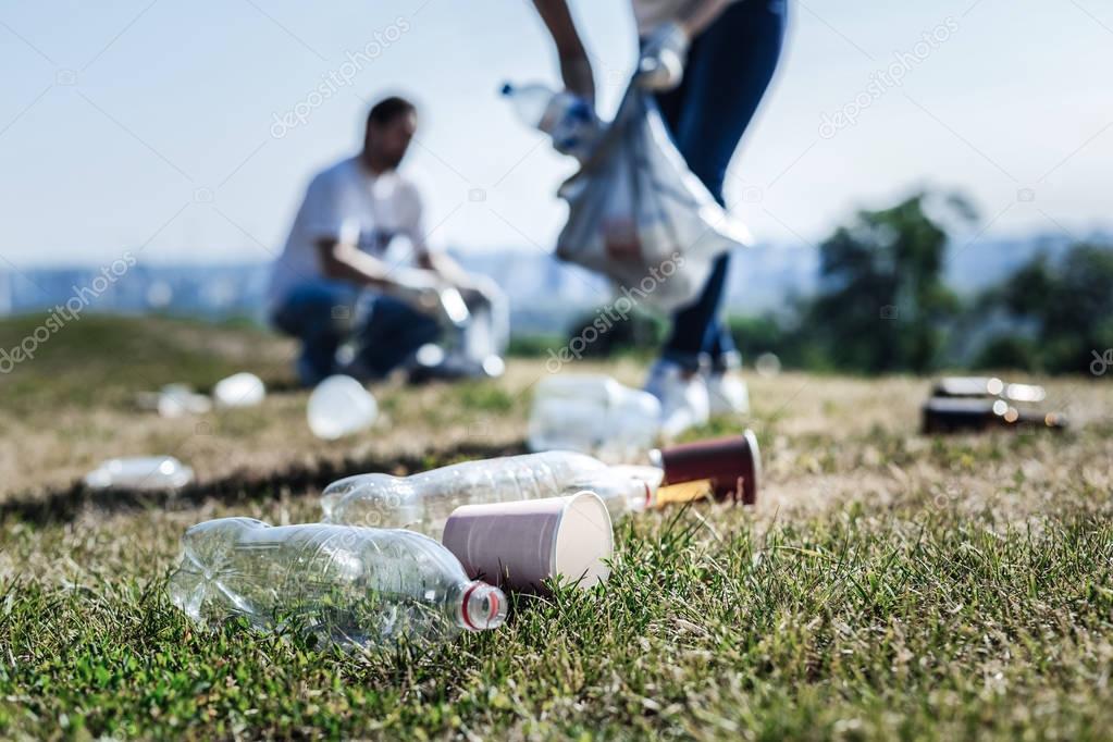 Selective focus of litter lying on the grass