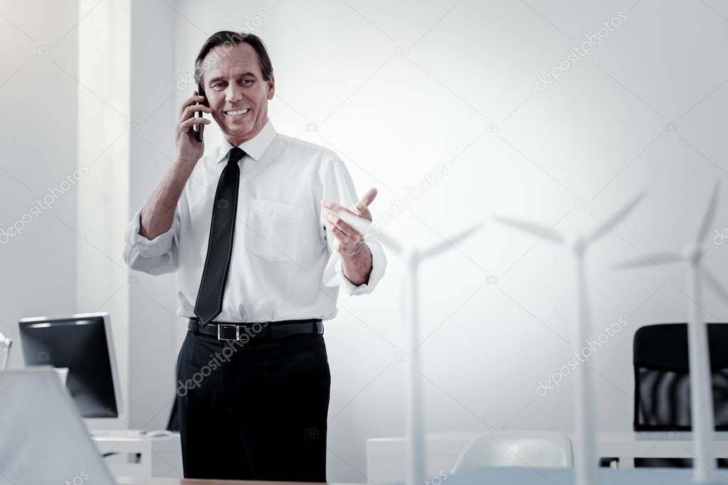 Busy male person having important call