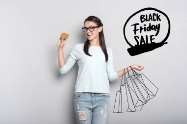 Gold card tutarak ve Black Friday satış hakkında düşünme güzel kadın