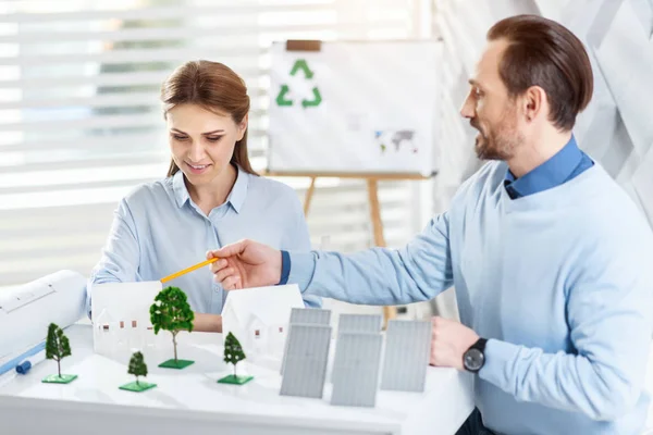 Inspired co-workers working on an environment project — Stock Photo, Image