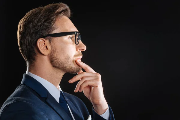 Deep busy man touching to his chin and thinking. — Stock Photo, Image