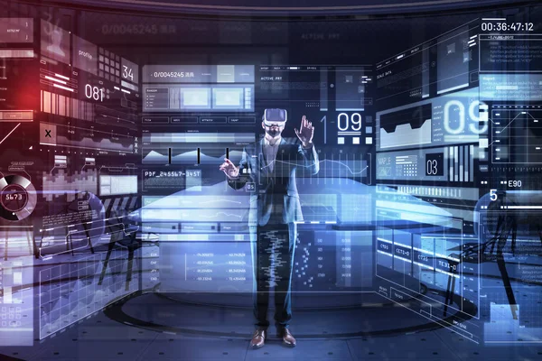 Concentrated programmer touching the screen while being in virtual reality — Stock Photo, Image