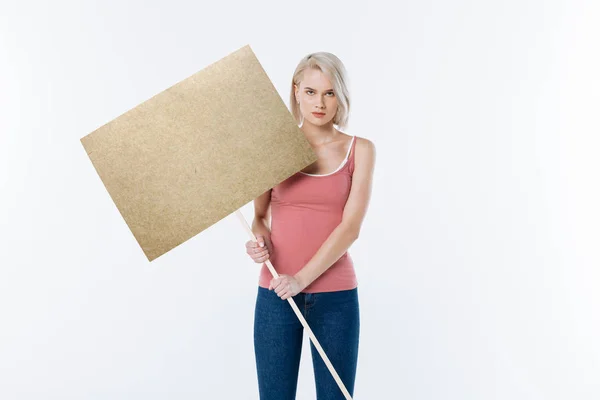 Mujer joven y agradable sosteniendo un cartel —  Fotos de Stock