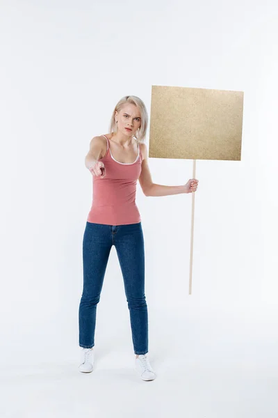 Nice pleasant woman standing against white background — Stock Photo, Image