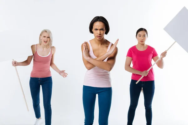 Nice serious woman holding her hands crossed — Stock Photo, Image