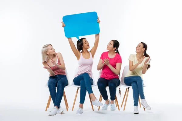 Nice positive women looking at their friend — Stock Photo, Image