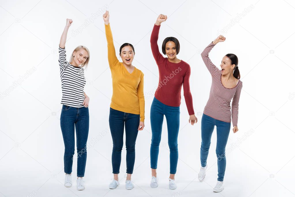 Joyful attractive women saying yes