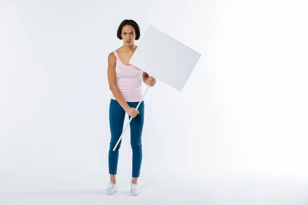 Cheerless unhappy woman raising social awareness — Stock Photo, Image