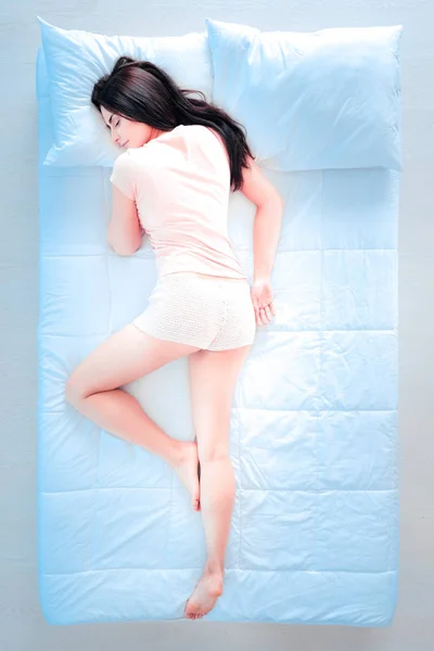 Tender female person lying on right side — Stock Photo, Image