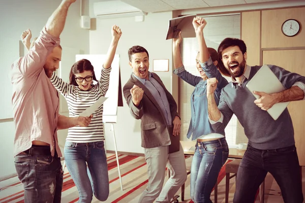 Happy delighted team showing their emotions — Stock Photo, Image
